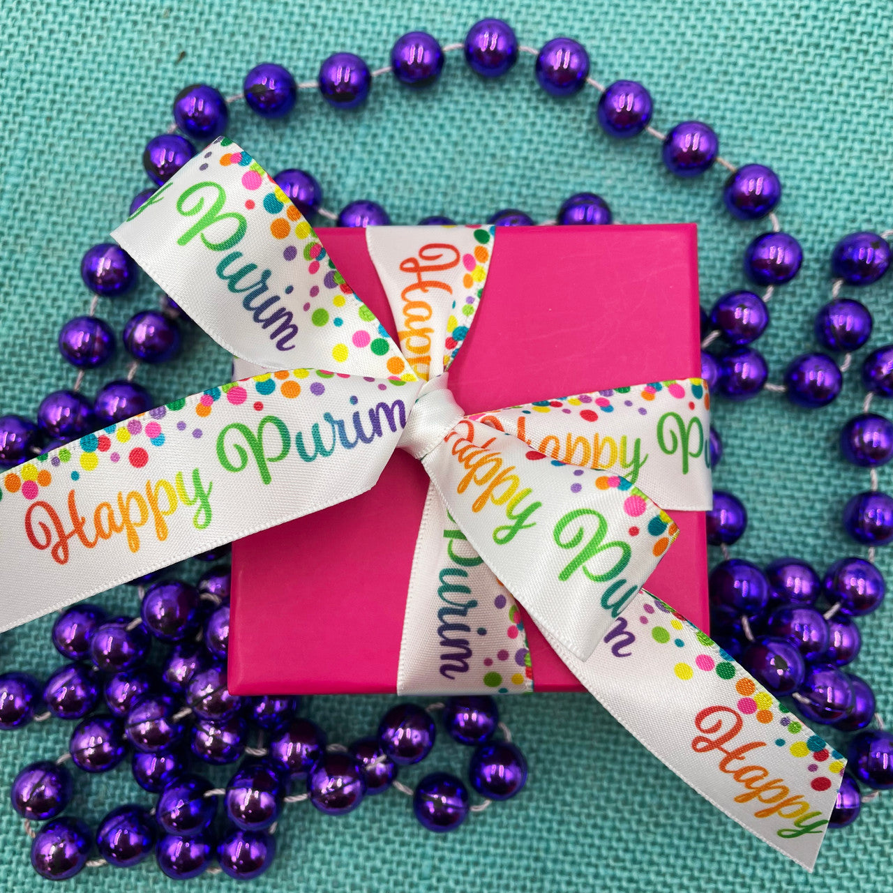 Tie a small gift with our Happy Purim ribbon for a fun Purim surprise! 