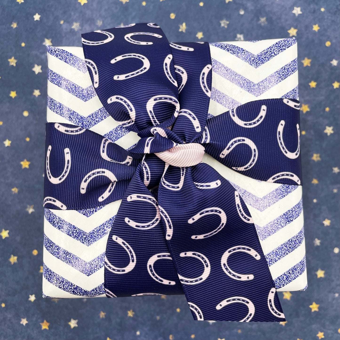 Tie our horseshoe ribbon with a lovely bow on a horse or equestrian themed gift for the horse lover in your life! 