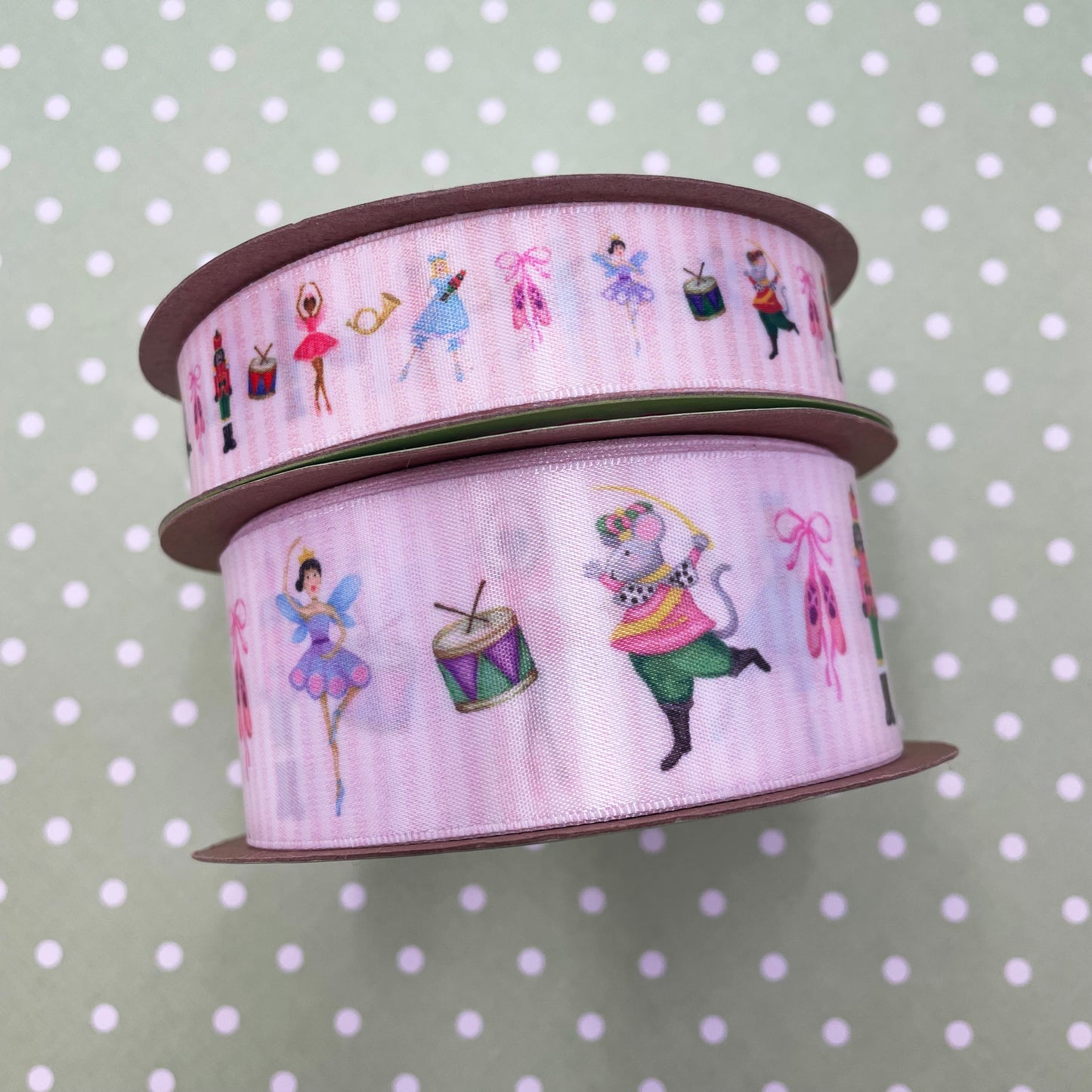 Nutcracker Ballet ribbon featuring all the characters printed on 1.5" white satin