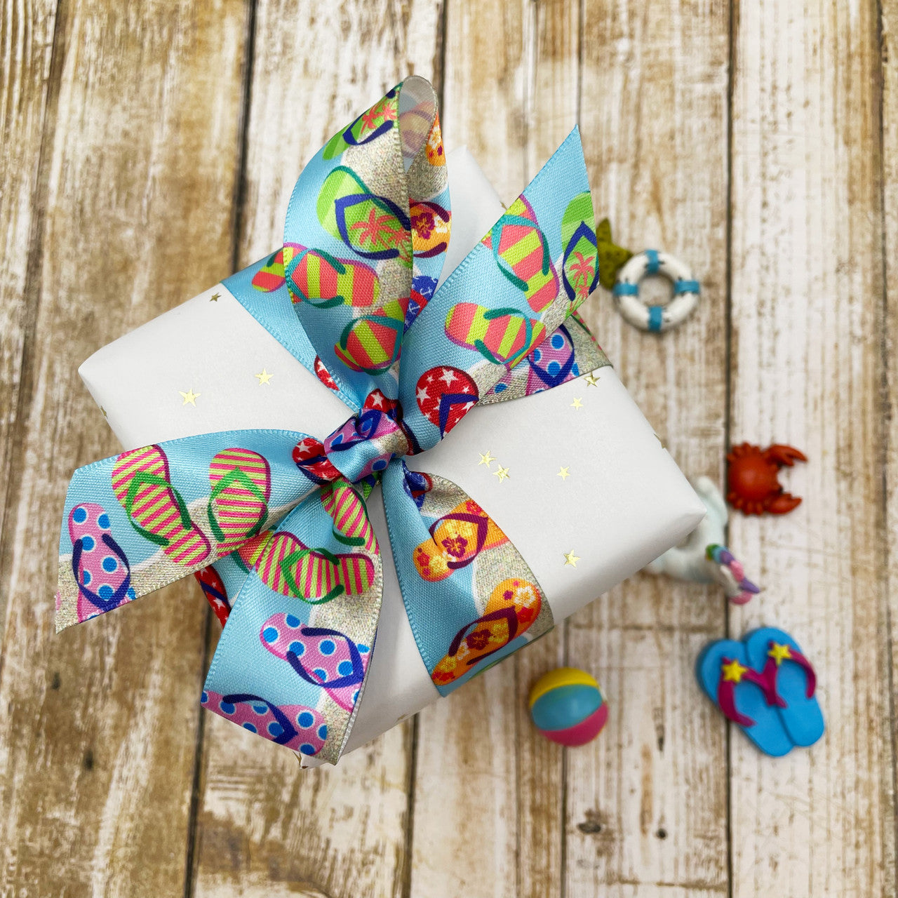 Tie a lovely little Summer themed gift with our beautiful flip flop ribbon for a whimsical presentation! 