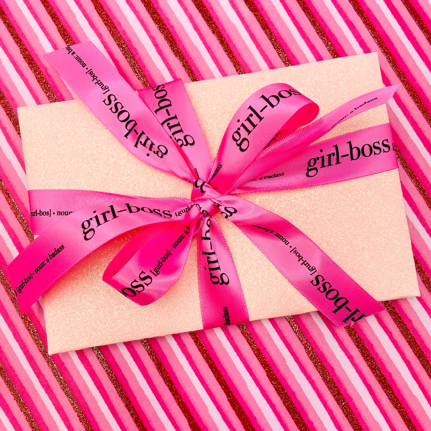 Tie a pretty bow on a light pink packages for a fun gift for your girl boss or the girl boss to be! 