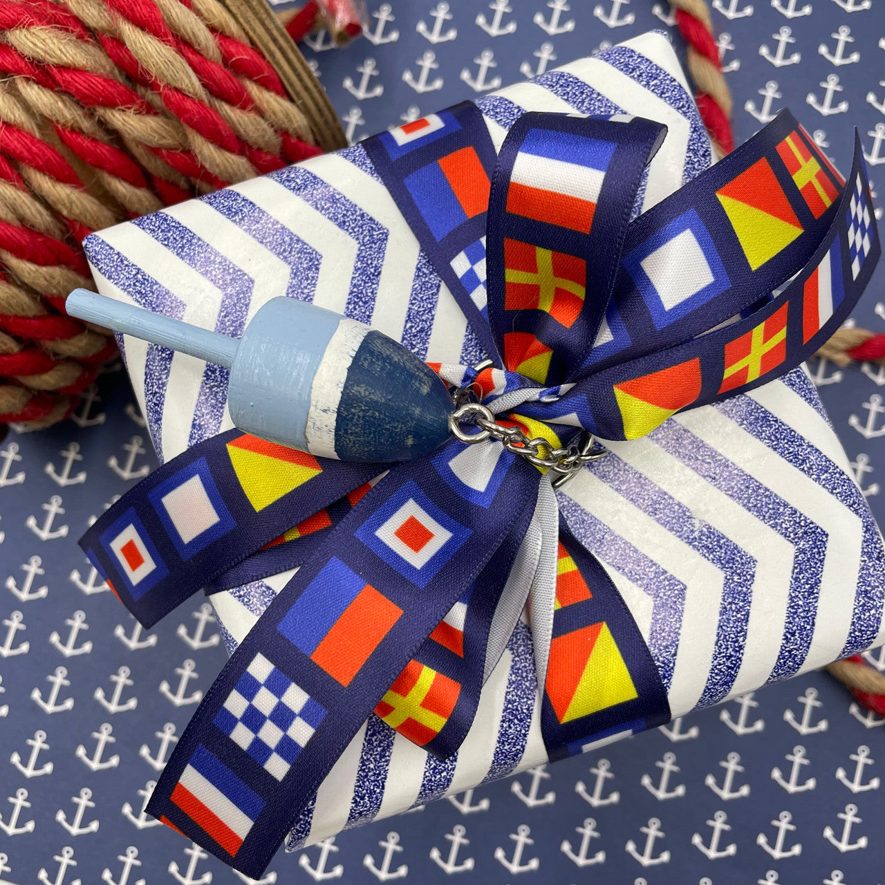 Tie a lovely gift with our Nautical Flags ribbon to signal your favorite person just special they are! 