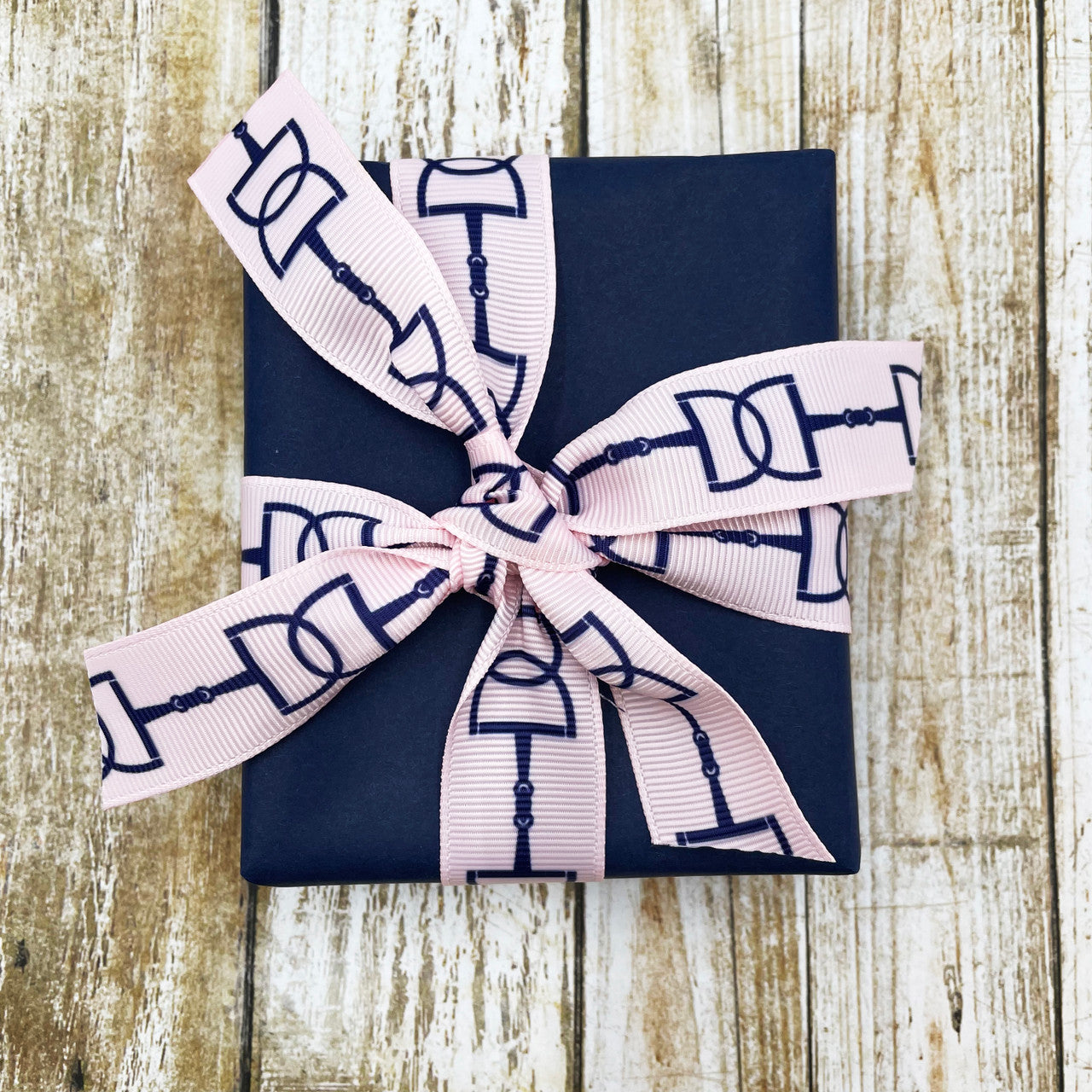 Snaffle bit ribbon with black or navy bits printed on 7/8"white or pink  single grosgrain