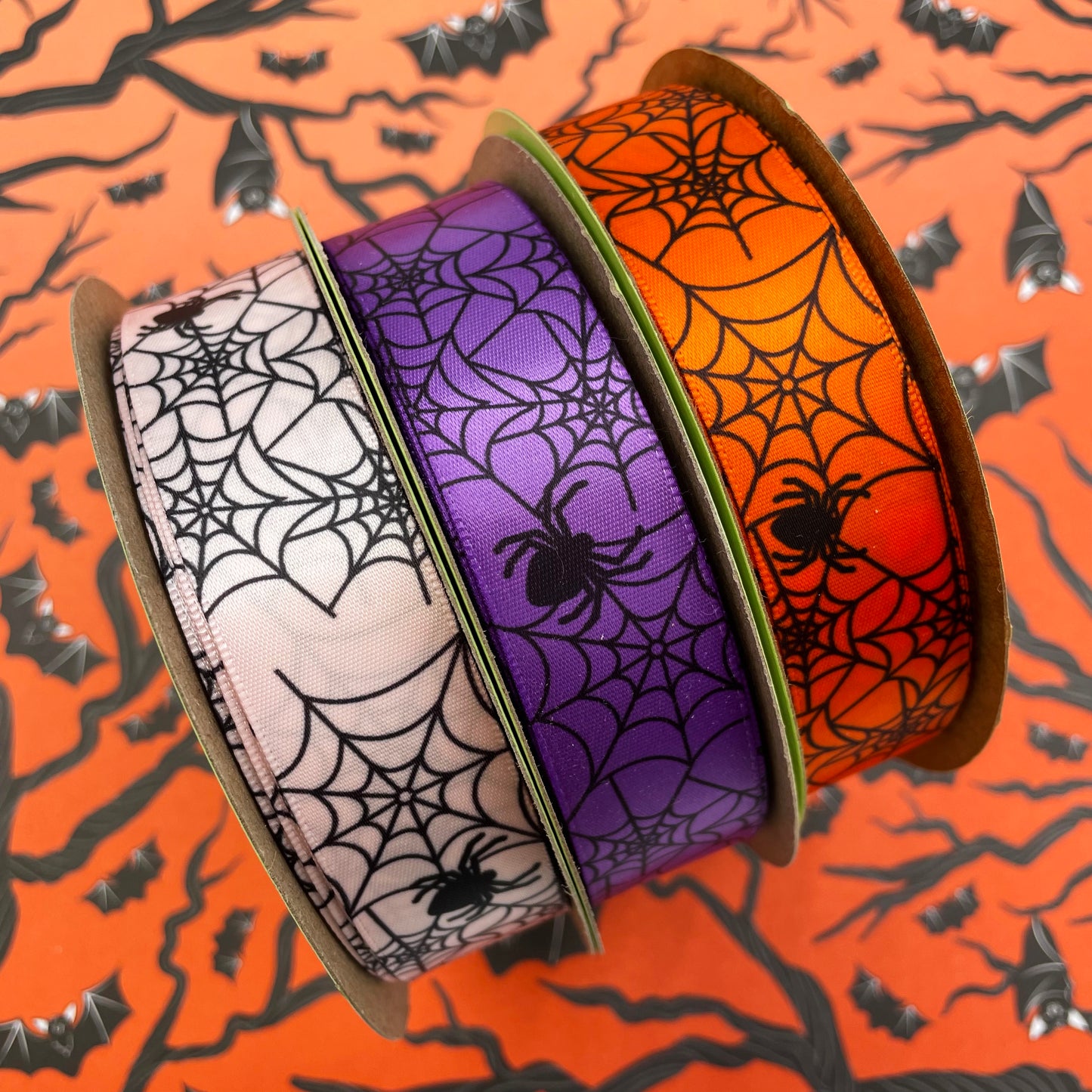 Spider Web Ribbon and Spiders in black on 7/8" orange, purple and pink single face satin