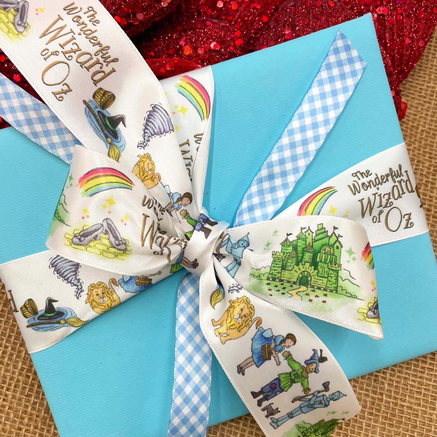Mix and match our Wizard of OZ ribbon with our lovely blue and white gingham to make a fun reference to Dorothy when tying an Oz themed gift! 