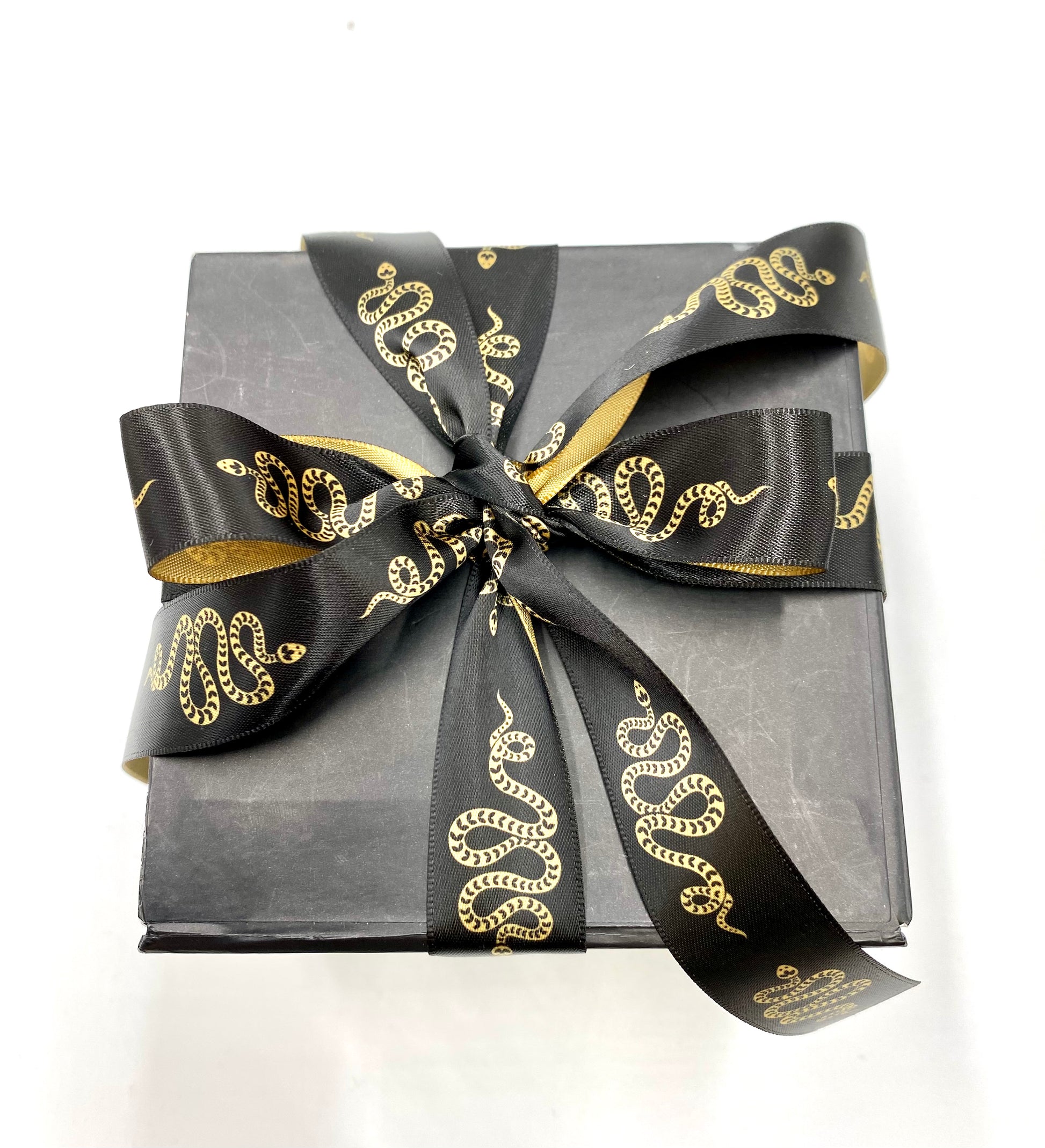 Tie our snake ribbon on a small gift for the mystic in your life! 