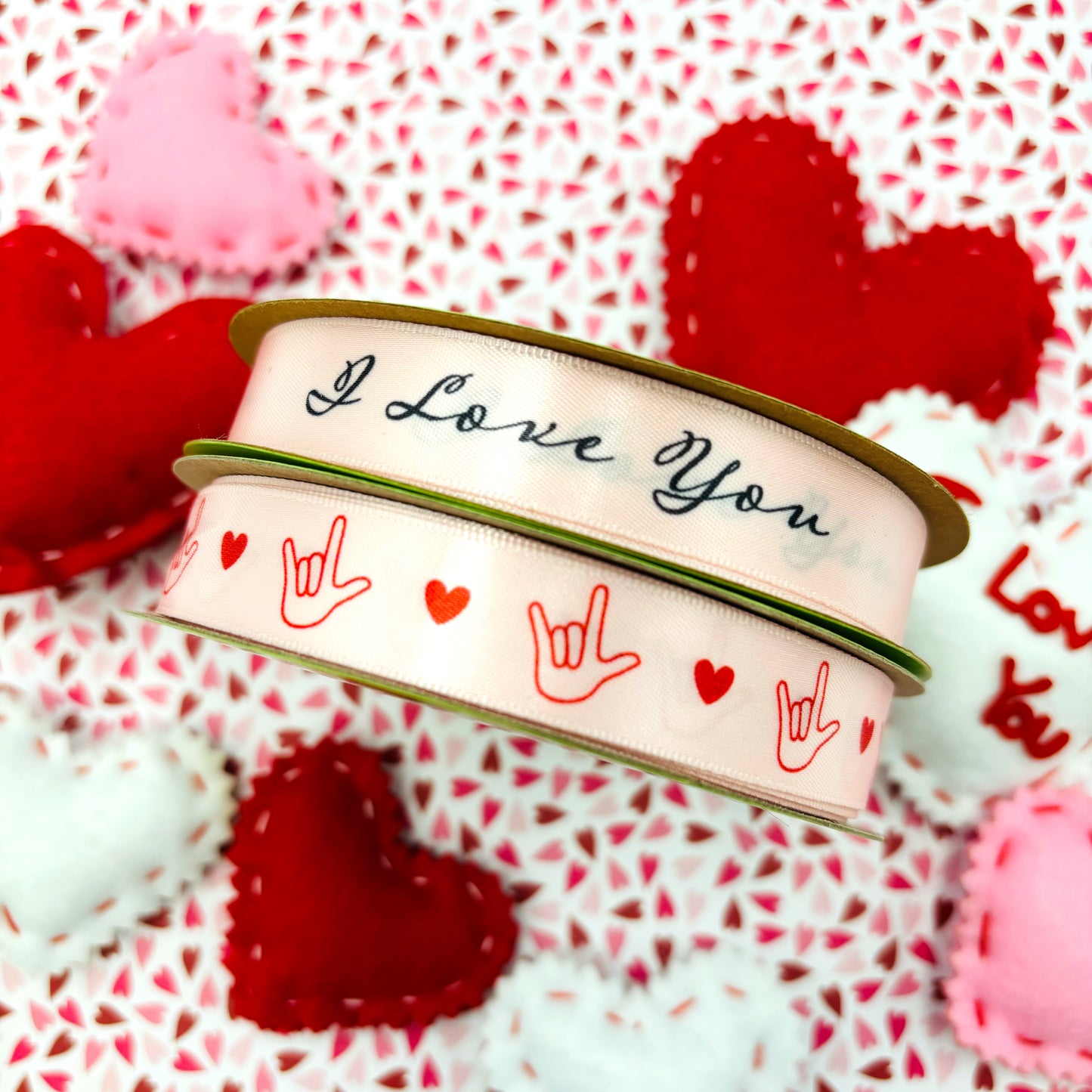 Sign Language ribbon I love you hand sign with a heart in red for Valentine's Day printed on 5/8" pink satin