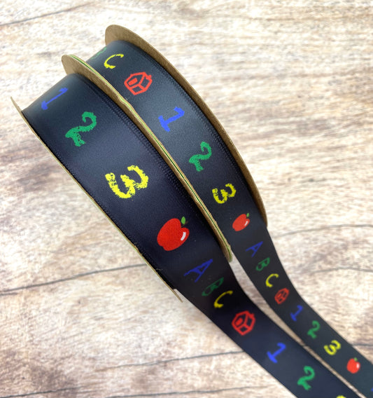 ABC's and 123's Ribbon in Primary Colors on a black background printed on 5/8" and 7/8"  white satin