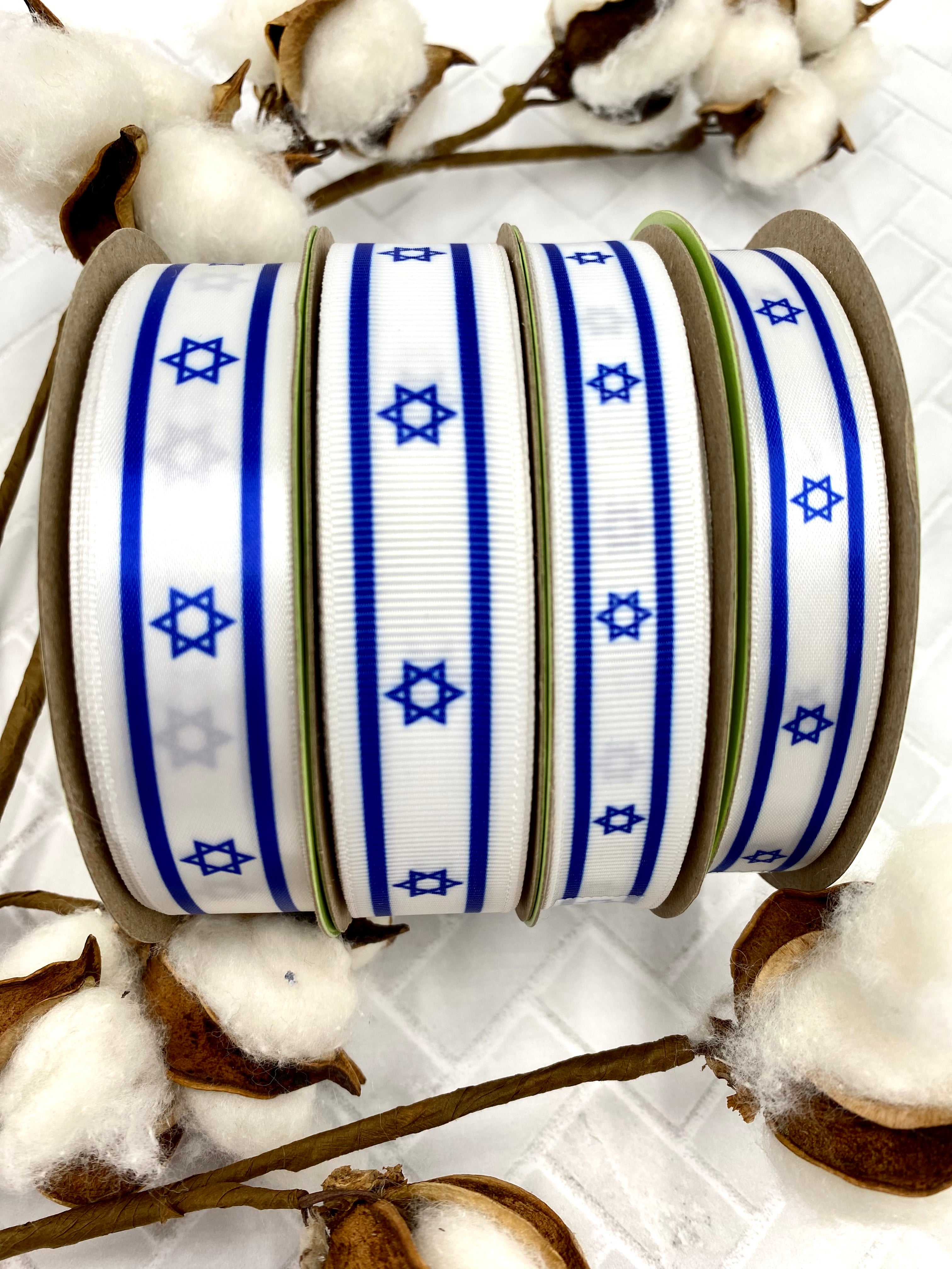 Israeli Flag ribbon royal blue stripe at top an bottom with the Star o