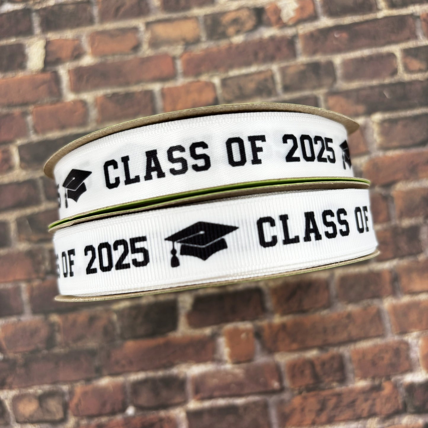 Graduation Class ribbon Class of 2025 in black with a black mortar board printed on 5/8" and 7/8" satin and grosgrain