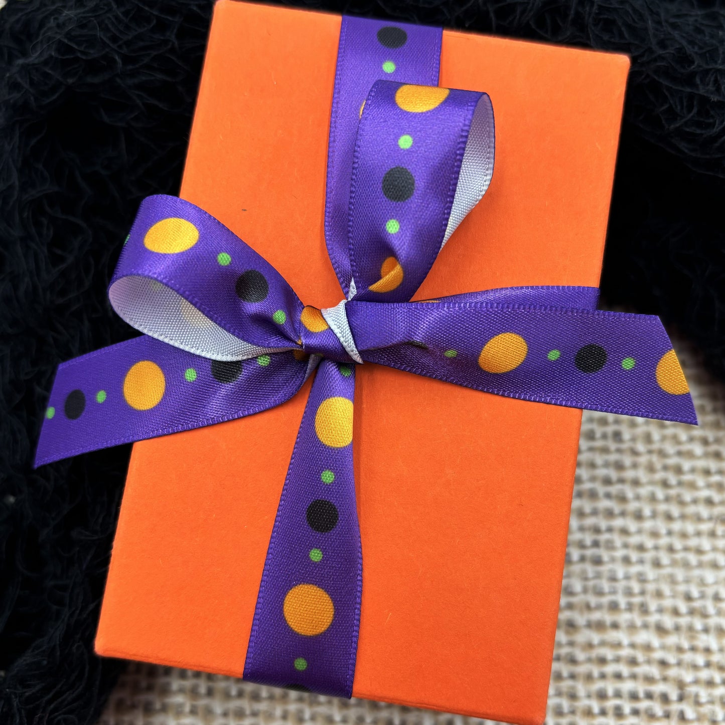 Halloween dots in two variations pastels with purple and tradtional with black printed on 5/8" satin