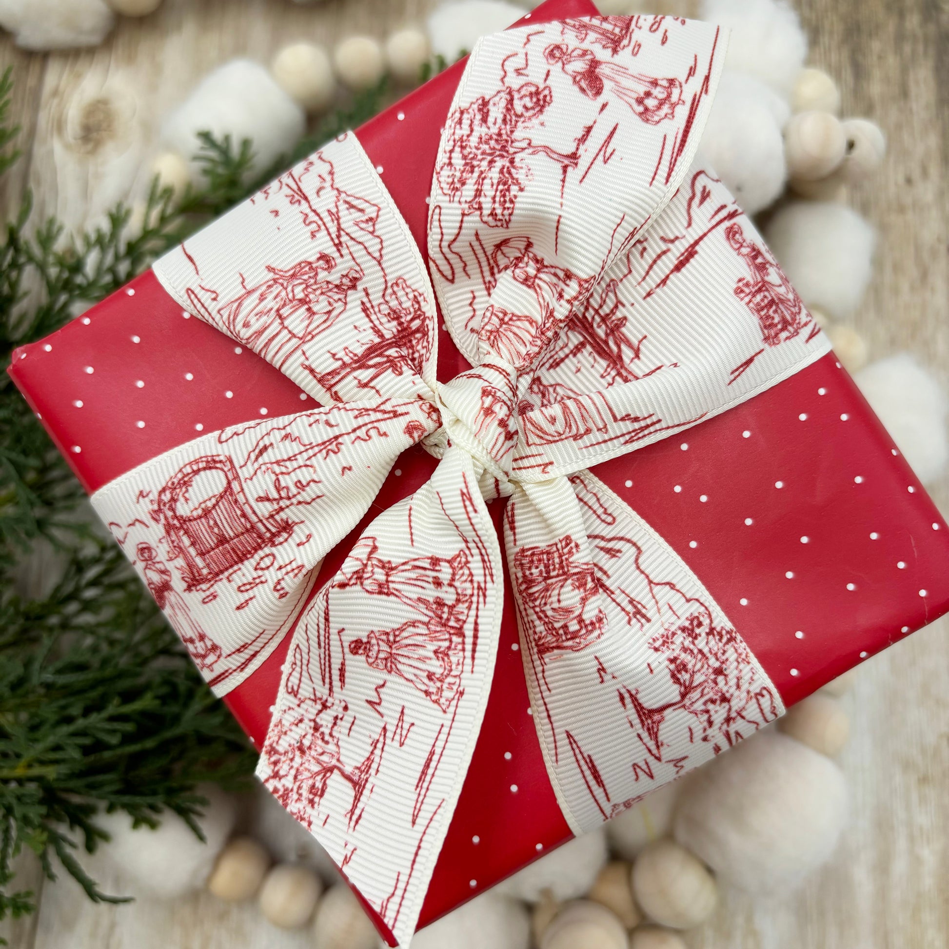 French Toile Ribbon in red with a pastoral scene of a couple strolling