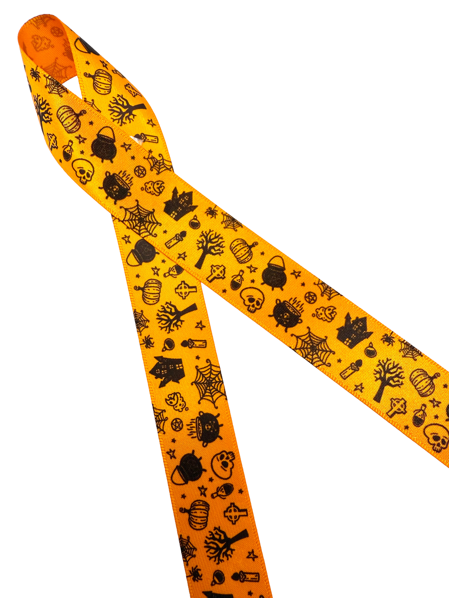 Halloween Ribbon tossed elements of skulls, haunted houses, cauldrons, scary trees and more in black printed on 5/8" and 7/8" tangerine single face satin