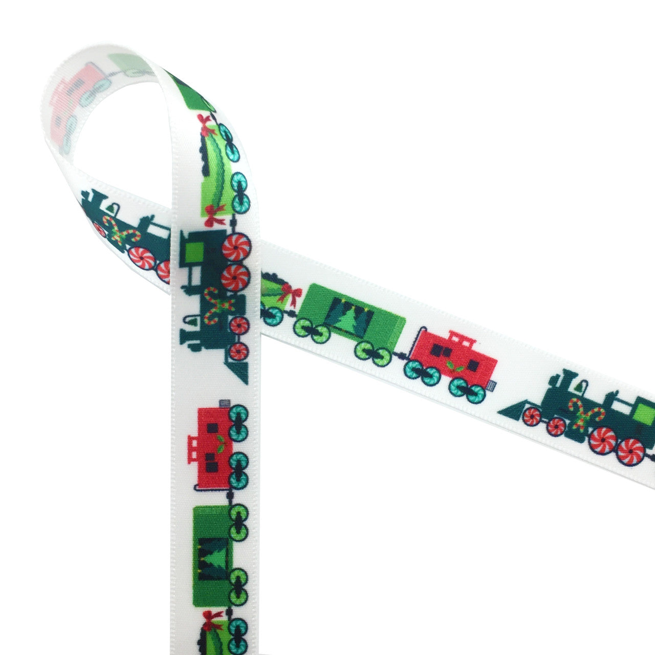 The Christmas train chugging along the tracks is a fun accent ribbon for favors, packages and table decor. This ribbon is printed on 5/8" white single face satin and is designed and printed in the USA