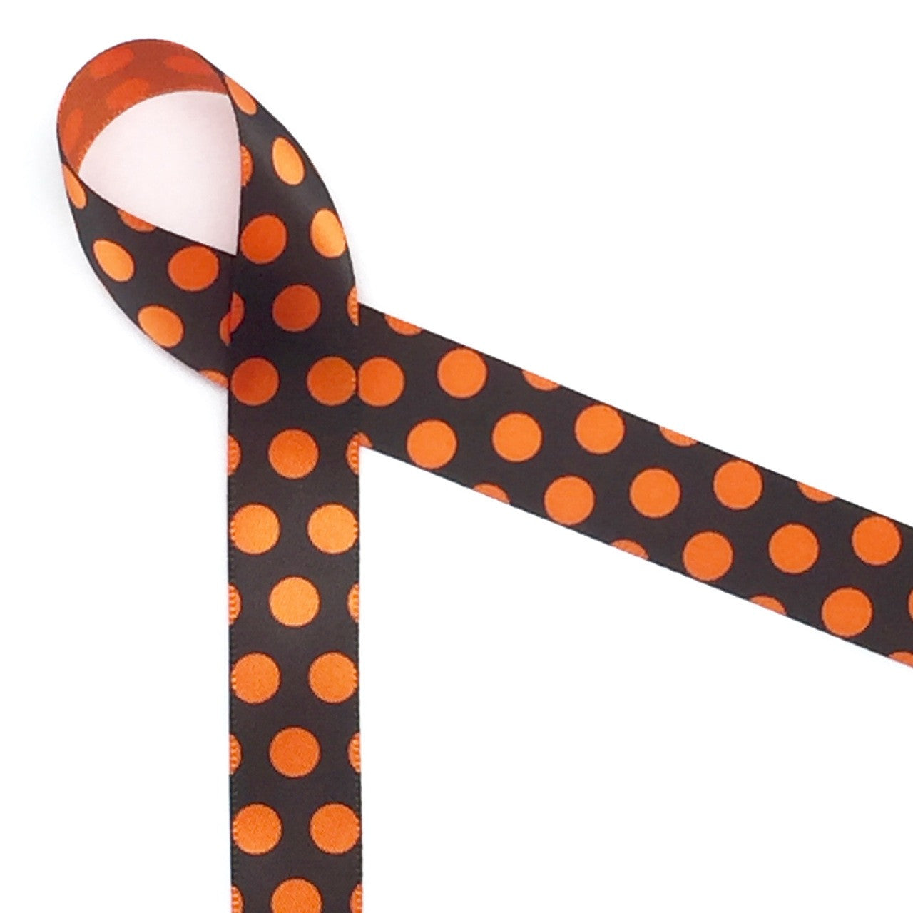 Nothing says Halloween like black and orange dots! Orange polka dots on a black background printed on 5/8" orange satin ribbon is a Halloween tradition. This Halloween classic design is ideal for party decor, party favors, gift wrap, gift baskets, treat bags, candy shops, bakeries, cookies and cake pops! This is a great design for Halloween crafts, wreaths, sewing and quilting projects. All our ribbon is designed and printed in the USA