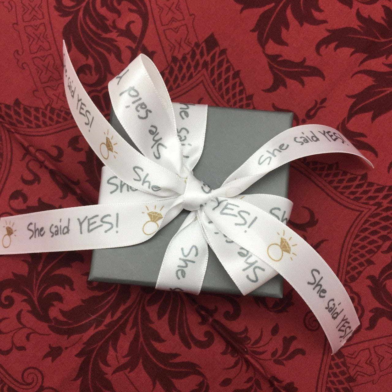 Tie a little box of congratulations for your newly engaged friend with our fun engagement ribbon!