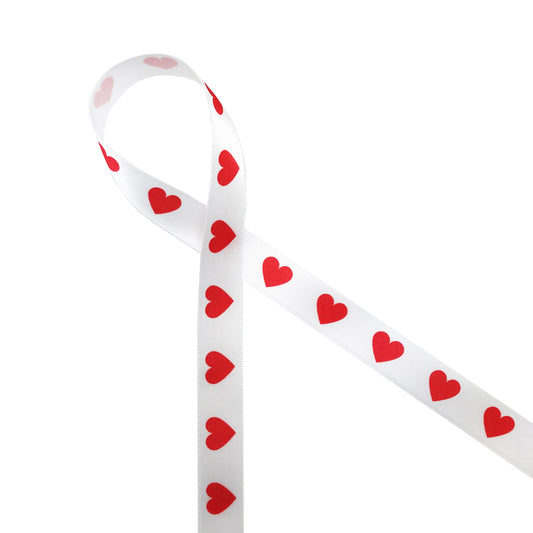 Nothing says Valentine's Day like red hearts lined up on5/8" white single face satin ribbon. This ribbon is perfect for gift wrap, gift baskets, party decor, cookies, candy shops, and chocolatiers. This is a great ribbon for crafting, sewing and quilting too. Use this ribbon for any Alice in Wonderland themed parties with our Alice ribbon! All our ribbon is designed and printed in the USA