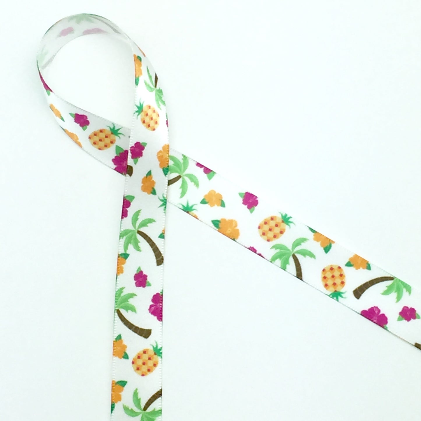 Hawaiian Ribbon with Palm trees Pineapples and Hibiscus blooms printed on 5/8' and 7/8" white single face satin