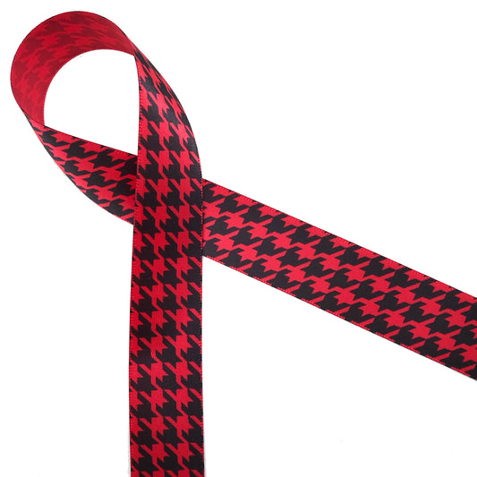 Houndstooth check in black printed on 1.5" red single face satin ribbon is a classic print for Holidays and everyday use. This is an ideal ribbon for hair bows,  holiday gifts, wreath making, decorating and sewing projects! Our ribbon is designed and printed in the USA