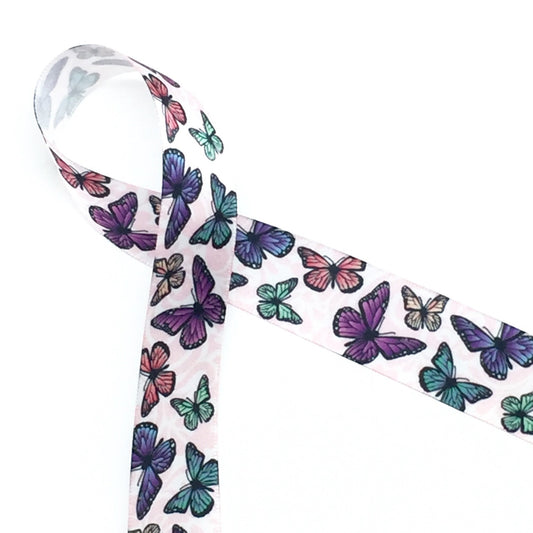 Butterflies flutter along a pink damask background on a 7/8" white single face satin ribbon.  Giving a gift to a nature lover? This is the ideal ribbon!