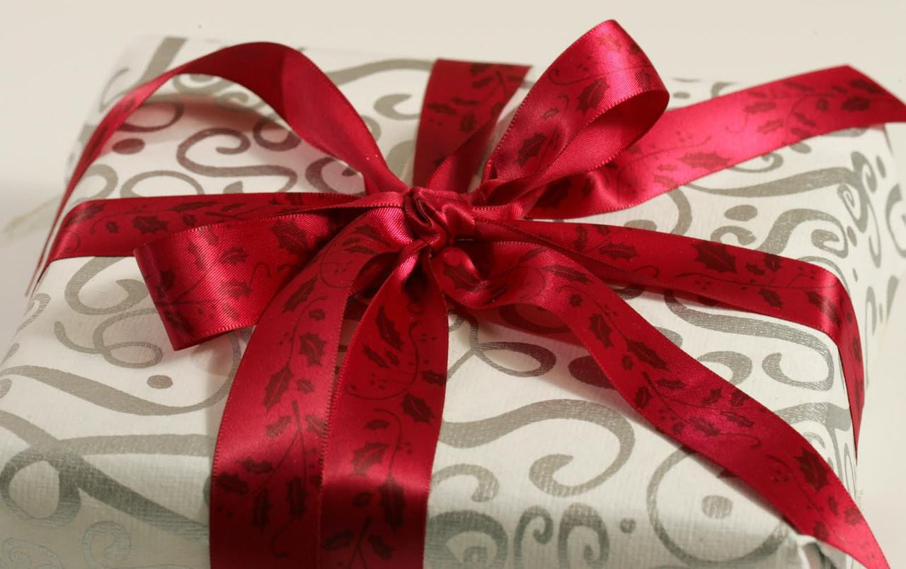 Our beautiful red on red holly ribbon makes for an elegant gift wrap!