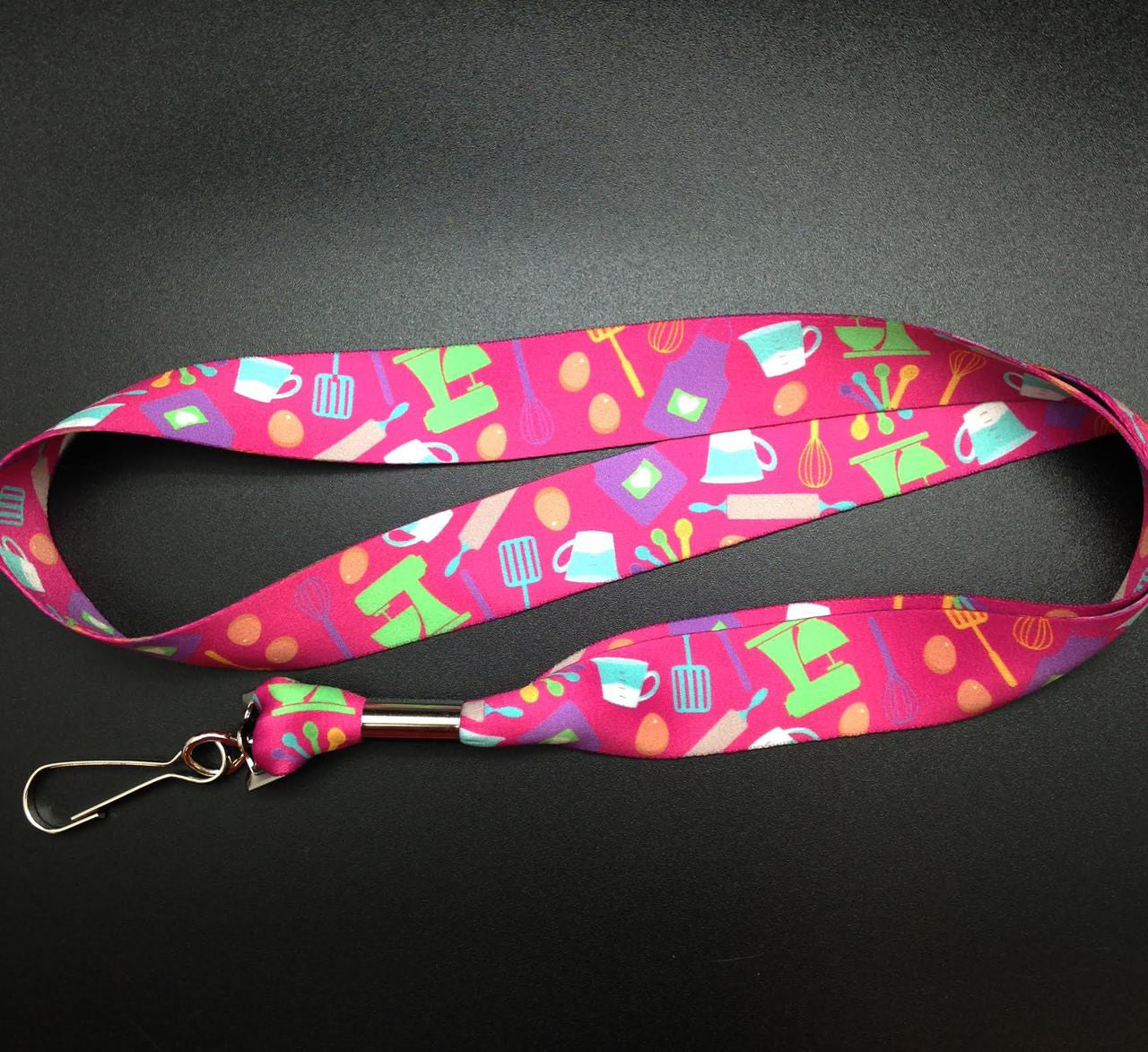 Lanyard featuring baking elements on a pink background 1"  soft webbing