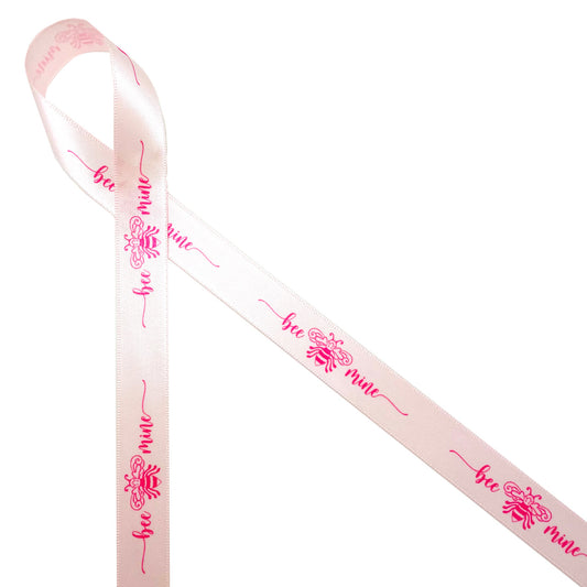 Bee Mine with a stylized bee in pink printed on 5/8" pink single face satin is a fun expression of new love. This is a sweet ribbon for a single rose, small gift, cookie, chocolates and candy boxes. Be sure to have this ribbon on  hand for all your Valentine craft projects! All our ribbon is designed and printed in the USA!