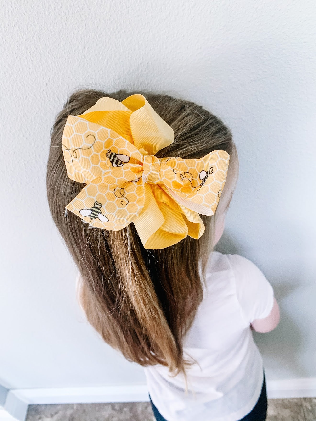 Buzzing Bees Ribbon with a yellow comb printed on 5/8", 7/8" and 1.5"  white grosgrain