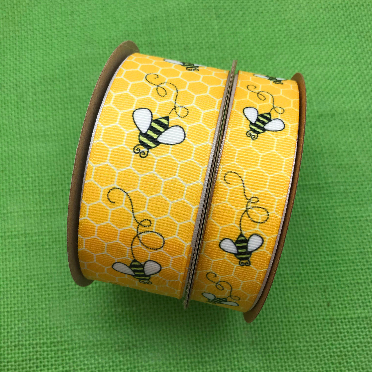 Our buzzing bees are offered in two sizes in grosgrain for your projects large and small. This ribbon is offered on 7/8" and 1.5" widths!