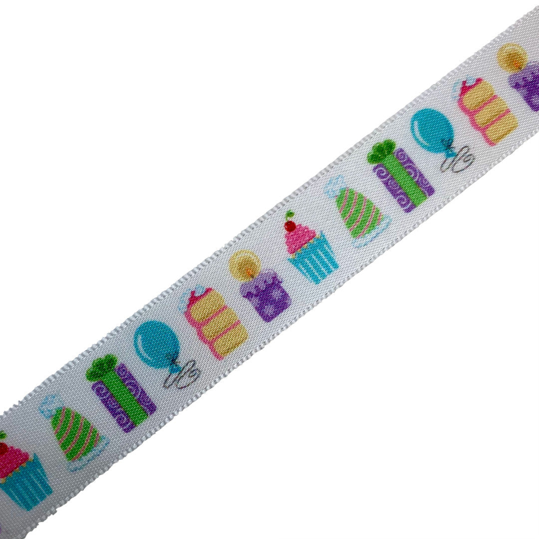 Birthday Party ribbon with cake, gifts, party hats and cupcakes printed on 5/8" white satin ribbon