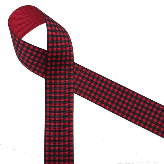 Buffalo plaid ribbon in black on 1.5" red grosgrain ribbon makes a wonderful holiday gift wrap ribbon! Tie this bold design on any gift for the outdoors person in your life!