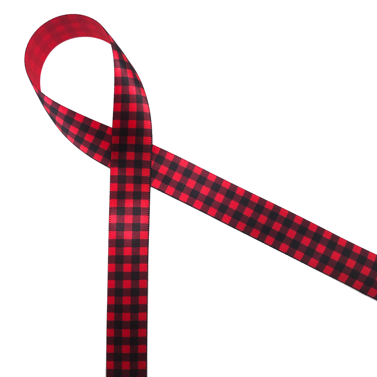 Red and black buffalo plaid is printed on 5/8" red  single face satin ribbon. This traditional plaid makes a country Christmas theme complete.