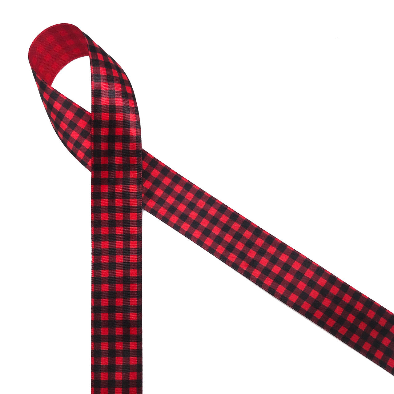 Red and black buffalo plaid is printed on7/8" red  single face satin ribbon. Red and black plaid is a great pattern for Fall themed parties. This traditional plaid also makes a country Christmas theme complete.