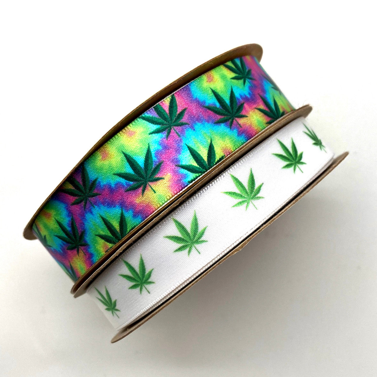 Marijuana leaves in shades of green printed on 5/8 white single