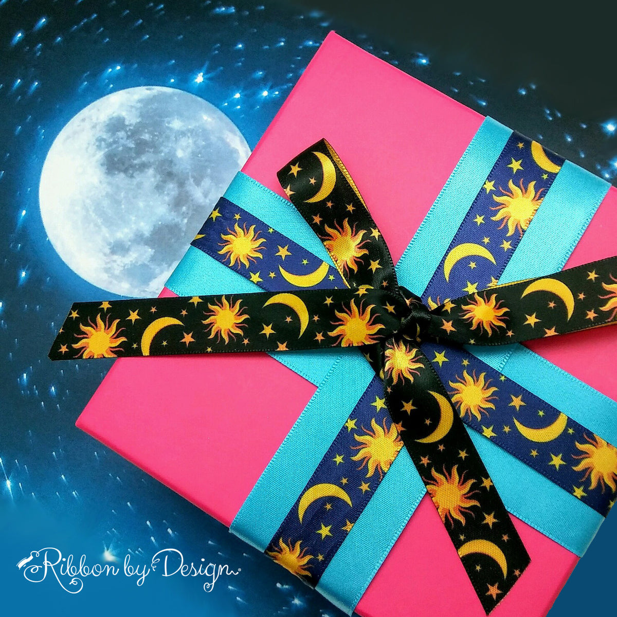 Celestial Ribbon Sun, moon and stars ribbon on a navy background printed on 5/8