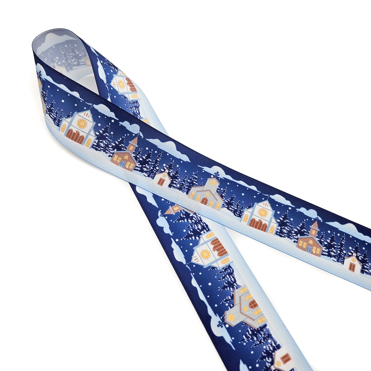 Churches in the snow on a navy blue background with pine trees and snowfall printed on 7/8 and 1.5" white single face satin