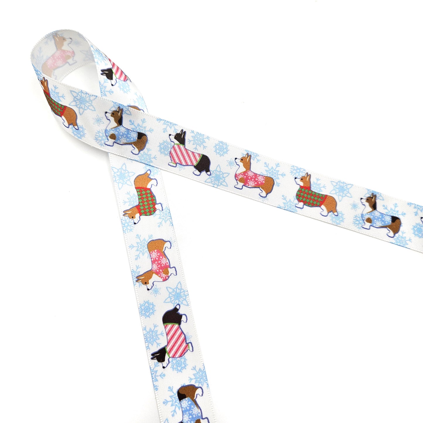 Dog Ribbon Corgi's in Holiday sweaters with snowflakes in the background printed on 5/8" and 7/8"white  single face satin