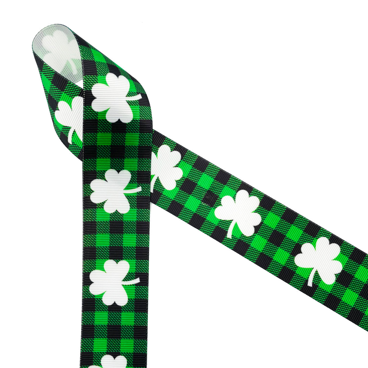 May the luck of the Irish be with everyone on St. Patrick's Day! White clovers on a green and black buffalo plaid background printed on 1.5" grosgrain satin ribbon is the perfect ribbon for St. Patrick's Day gift wrap, gift baskets, party decor, table decor, floral designs and crafts. This is a great ribbon for wreath making, sewing and quilting projects too. All our ribbon is designed and printed in the USA