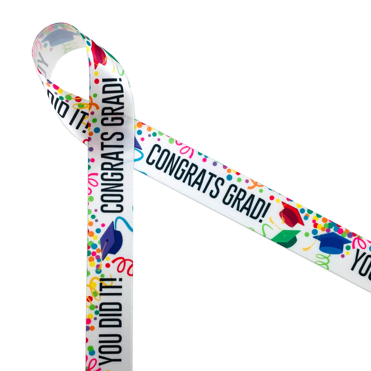 Graduation is a celebration of achievement! Congrats Grad with tossed hats of red, blue, green, black and purple with colorful confetti printed on 7/8" white single face satin is the perfect ribbon for gift wrap, party decor, party favors, and sweets tables. This is a great ribbon for Graduation themed crafts, sewing and quilting projects too! All our ribbon is designed and printed in the USA