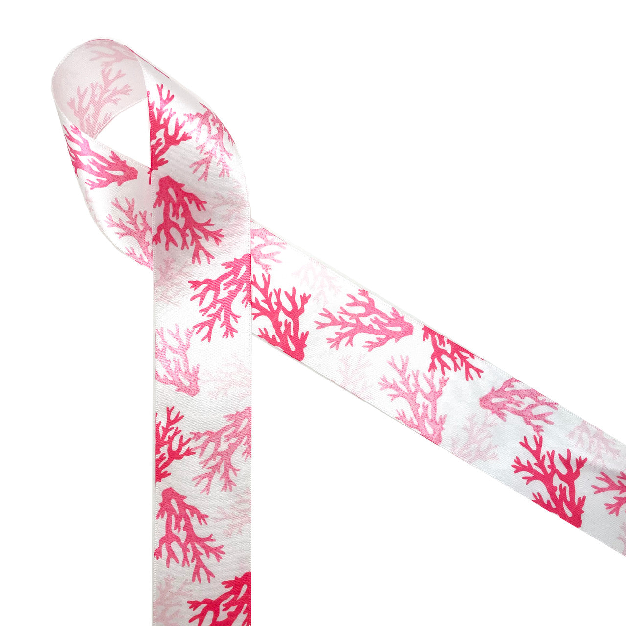 Coral Reef  patterns are trending in home decor and fashion! Our coral reef ribbon in shades of pink printed on 1.5" white single face satin is perfect for any beach, tropical or reef themed event! This is the perfect ribbon for tying gifts for a tropical themed wedding or bridal shower! Be sure to have this beautiful ribbon on hand for all you Summer crafting! Our ribbon is designed and printed in the USA
