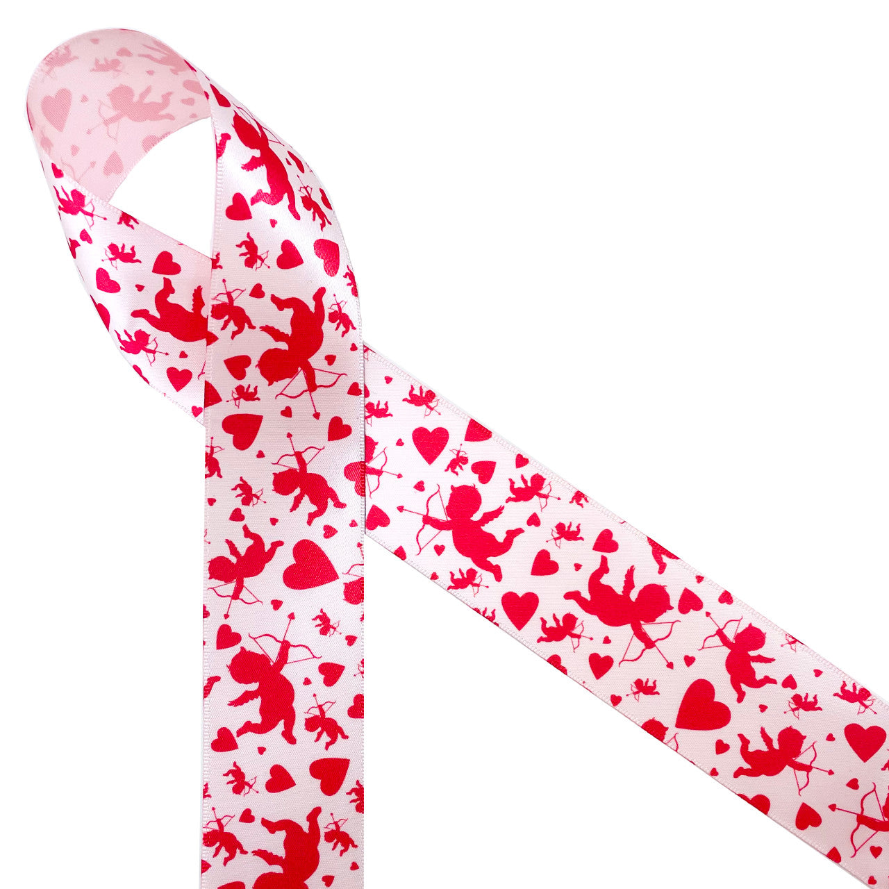 Cupid is aiming his arrows at hearts large and small creating Valentine fun!  Be sure to have this ribbon on hand for Valentine parties, favors, gifts, cookies, candy tables and cake pops! This adorable ribbon is printed in red on 5/8" pink single face satin ribbon.