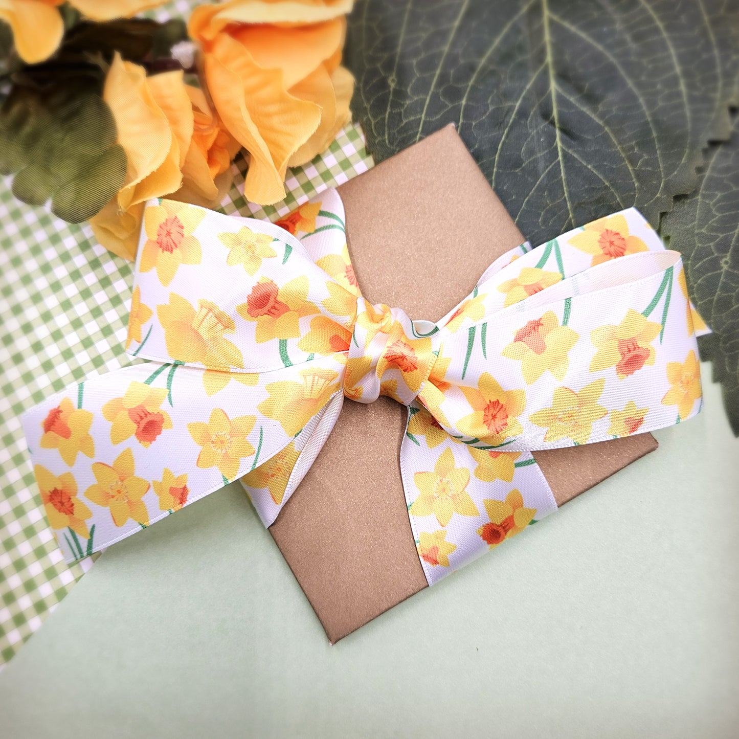 Daffodil Ribbon yellow and orange daffodils printed on 1.5" white single face satin