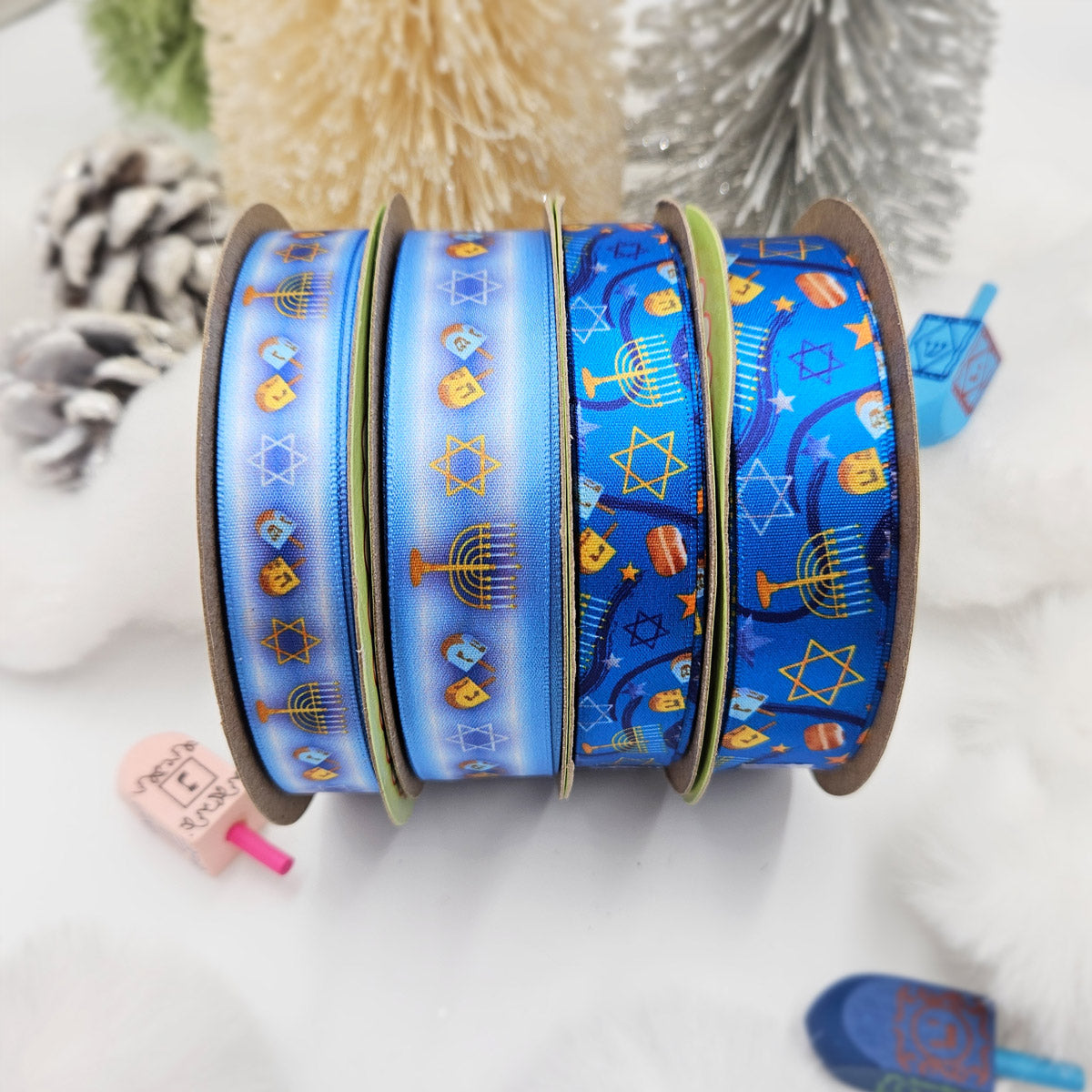 Hanukkah Ribbon in shades ofLight  blue with Menorahs, dreidels and Star of David in a row for gifts printed on 5/8" and 7/8" white satin