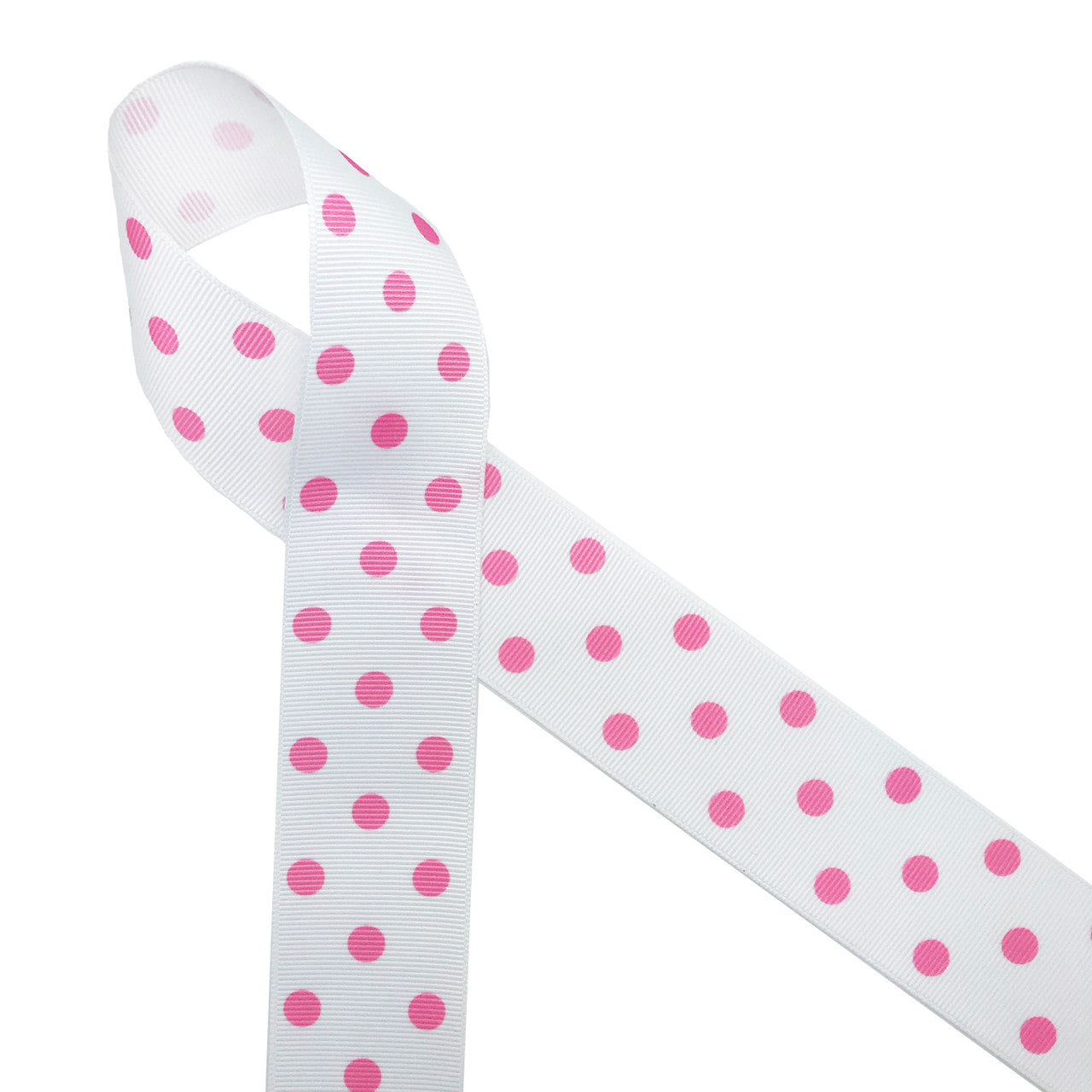 Bright pink polka dots on 1.5" white grosgrain ribbon is a fun pattern for hair bows, hat bands, trims and gift wrap!