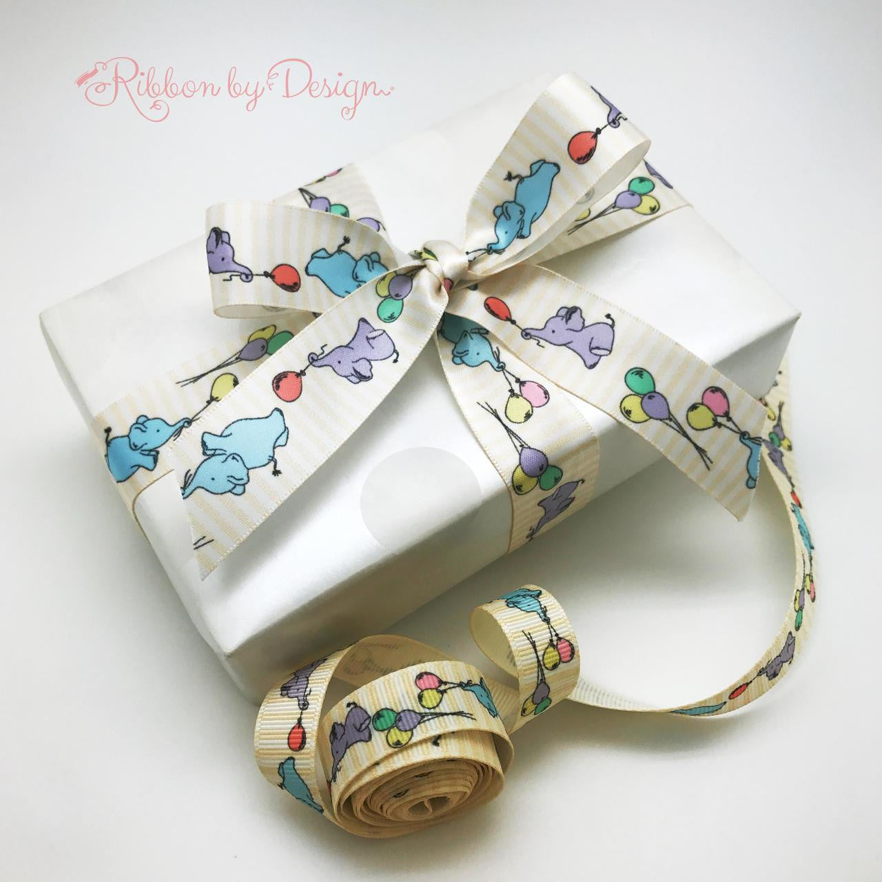 We loved this ribbon design so much we created it in satin and grosgrain! It will make a baby gift really pop when used to tie a gift!