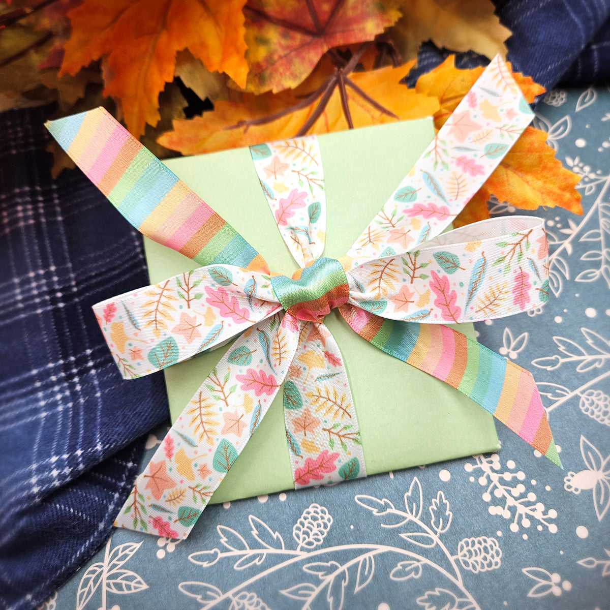 Pastel Fall Floral ribbon with  leaves, ferns and buds in  shades of mint, butter yellow, peach and teal printed on 5/8" white satin