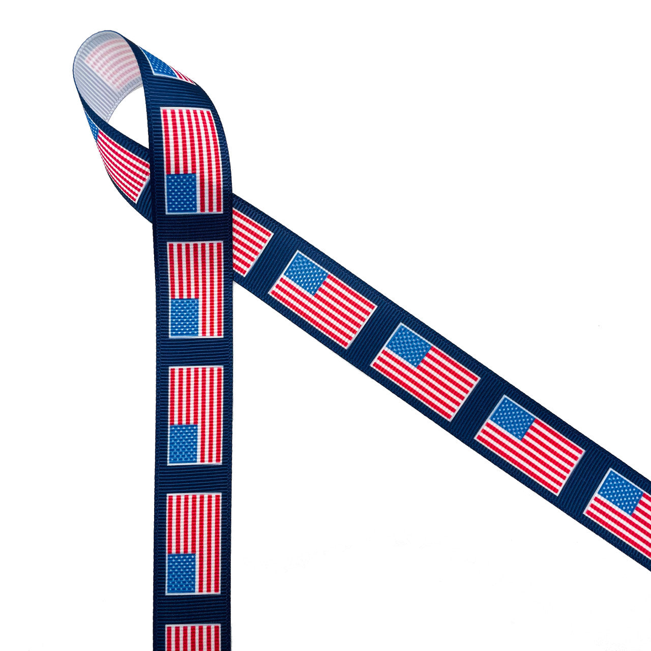 American Flags line up on a navy blue background printed on 7/8" white grosgrain ribbon for the perfect patriotic ribbon! This is an ideal ribbon for 4th of July, Memorial Day and Veterans Day. Use this ribbon for hair bows, wreaths, party decor and gift wrap for the biggest Summer holiday! All our ribbon is designed and printed in the USA