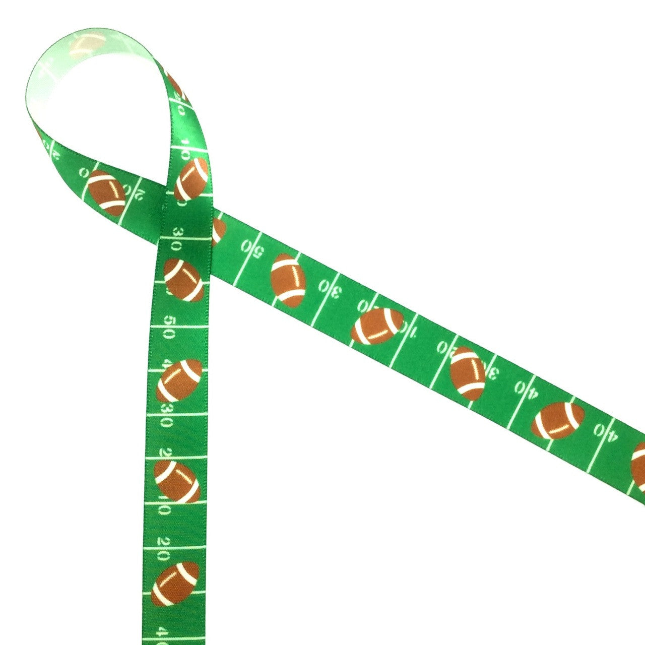 Footballs tossed along the green gridiron will make the perfect tie on your favors at your next football themed party!