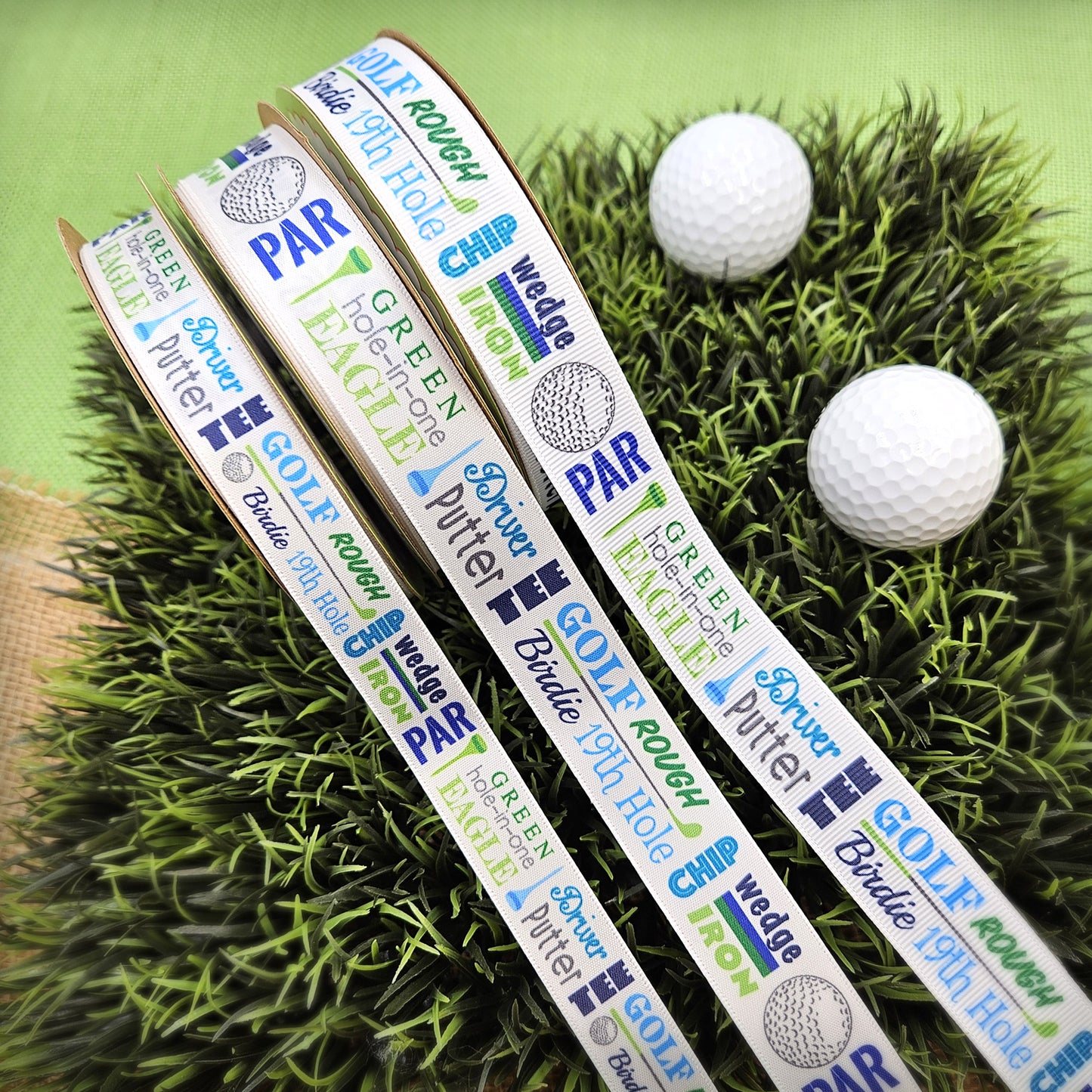 Golf word block ribbon in blue and green printed on 5/8" and  7/8" white single face satin and grosgrain