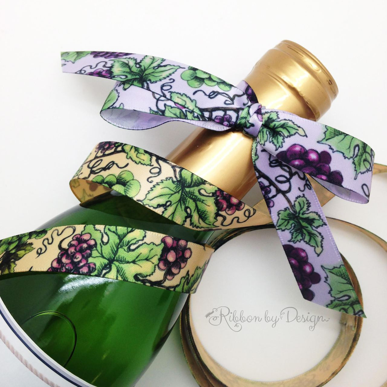 Our grape designed ribbon in both raw silk and light orchid are a perfect paring on a bottle of wine!